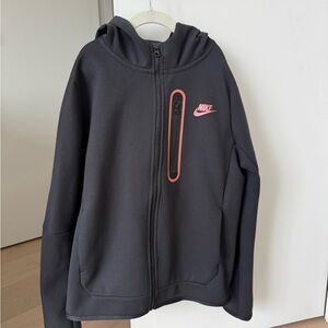 Nike Child Black Hoodie on a zipper. Size 10-12 years old.
